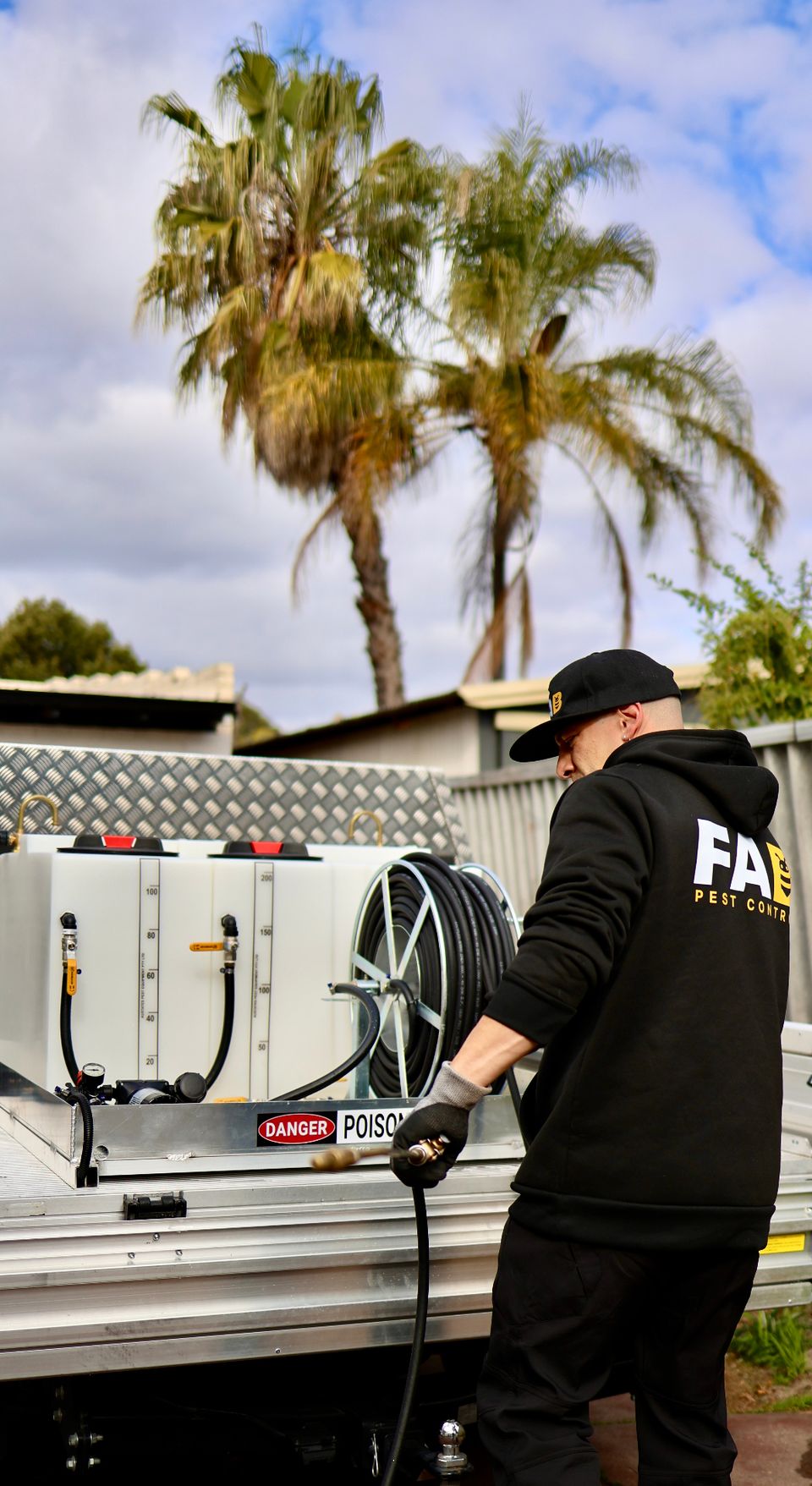 Fabien from FAB Pest Control checking the exterior of a Perth property for household pest activity and entry conditions.